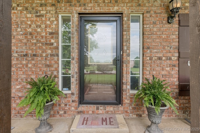 11902 N 150th E Ave, Collinsville, OK 74021 - view of exterior entry with brick siding