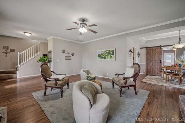 11902 N 150th E Ave, Collinsville, OK 74021 - living room with a barn door, stairs, a ceiling fan, dark wood-style floors, and ornamental molding