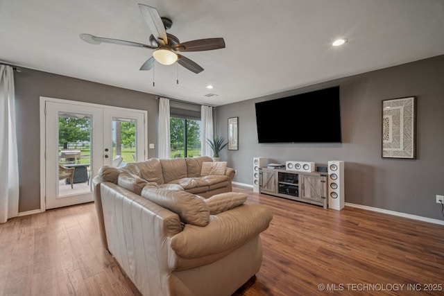 11902 N 150th E Ave, Collinsville, OK 74021 - living room with french doors, wood finished floors, a ceiling fan, and recessed lighting