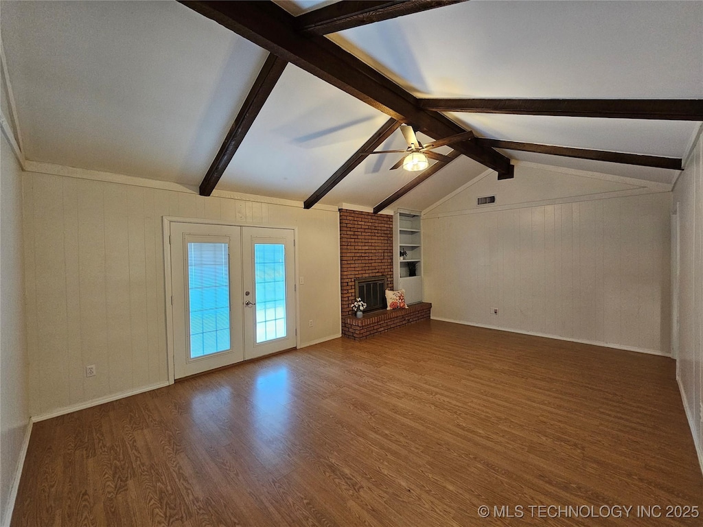 16211 E 109th St N, Owasso, OK 74055 - unfurnished living room with wood finished floors, ceiling fan, french doors, built in features, and a fireplace