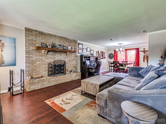 1304 W Kent St, Broken Arrow, OK 74012 - living area featuring crown molding, wood-type flooring, a brick fireplace, a chandelier, and a textured ceiling