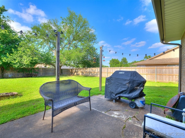 1304 W Kent St, Broken Arrow, OK 74012 - fenced backyard with a patio and a grill