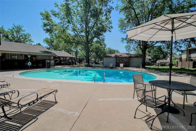 6370 S 80th E Ave Unit E, Tulsa, OK 74133 - community pool featuring a patio area