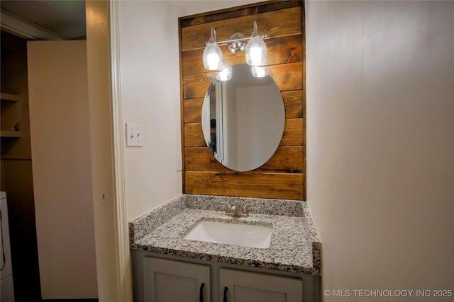 6370 S 80th E Ave Unit E, Tulsa, OK 74133 - bathroom with vanity and washer / dryer