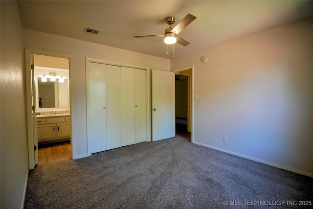 6370 S 80th E Ave Unit E, Tulsa, OK 74133 - unfurnished bedroom featuring carpet, a closet, ceiling fan, and connected bathroom