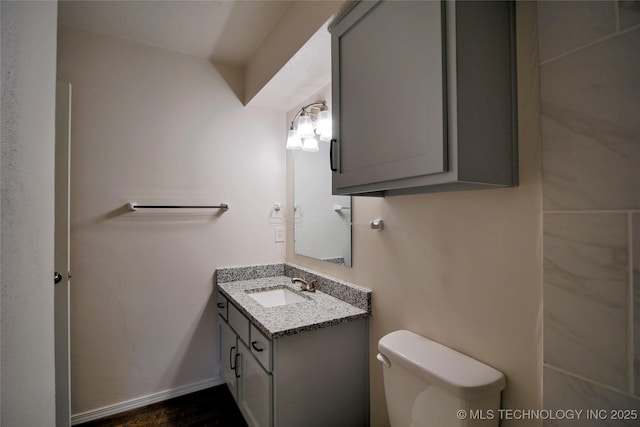 6370 S 80th E Ave Unit E, Tulsa, OK 74133 - bathroom with toilet and vanity
