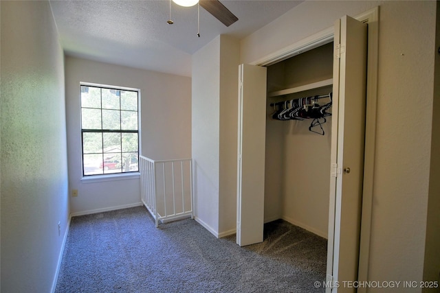 6370 S 80th E Ave Unit E, Tulsa, OK 74133 - unfurnished bedroom with carpet floors, a closet, and a ceiling fan