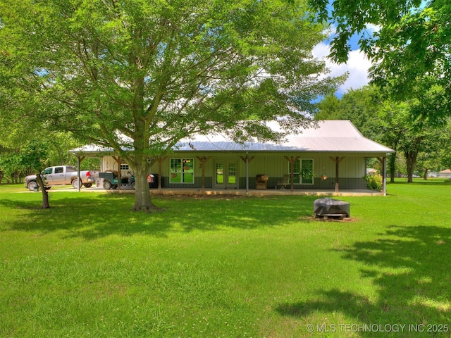 30833 S 4190th Rd, Inola, OK 74006 - rear view of property with french doors, a yard, and a metal roof