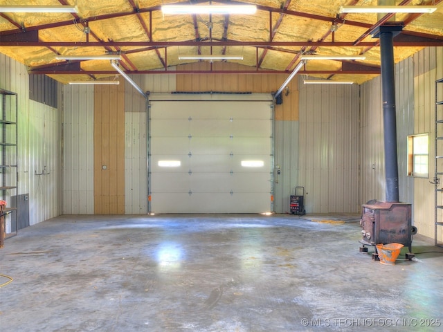 30833 S 4190th Rd, Inola, OK 74006 - garage with a wood stove
