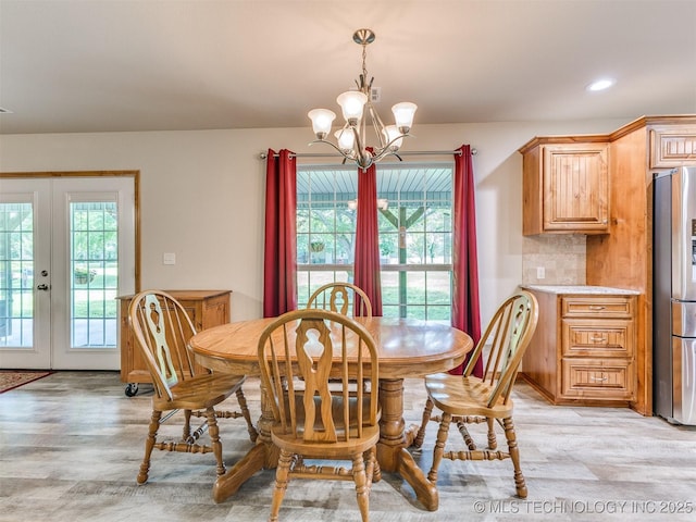 30833 S 4190th Rd, Inola, OK 74006 - dining area with a chandelier, french doors, light wood-style flooring, and recessed lighting