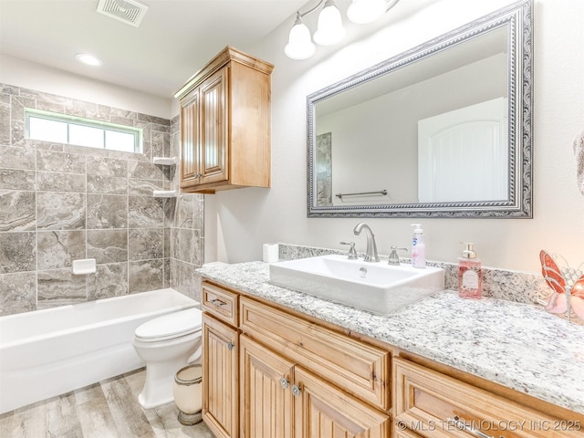 30833 S 4190th Rd, Inola, OK 74006 - full bathroom featuring vanity, wood finished floors, and tub / shower combination