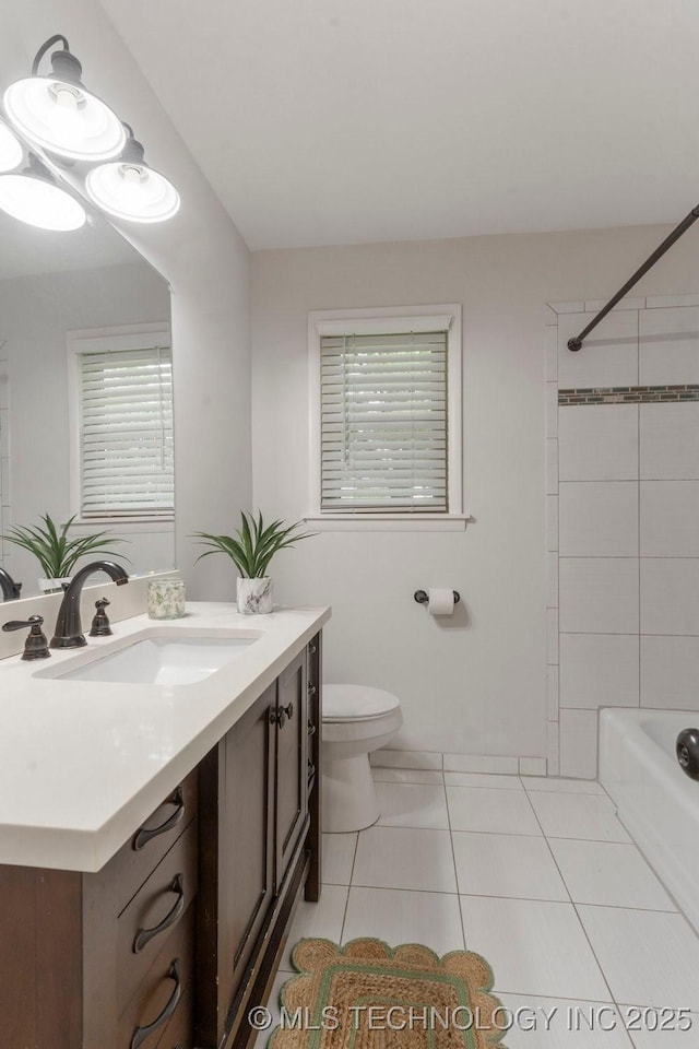 17069 S 87th Ave E, Bixby, OK 74008 - full bathroom with vanity, tile patterned flooring, and washtub / shower combination
