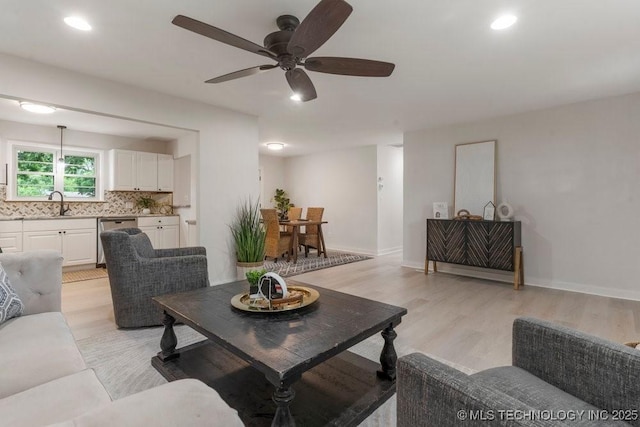17069 S 87th Ave E, Bixby, OK 74008 - living area with a ceiling fan, light wood-style floors, and recessed lighting