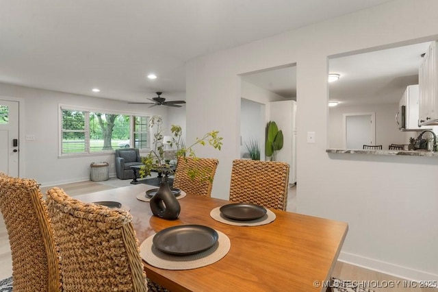 17069 S 87th Ave E, Bixby, OK 74008 - dining room with a ceiling fan, recessed lighting, and light wood-style flooring