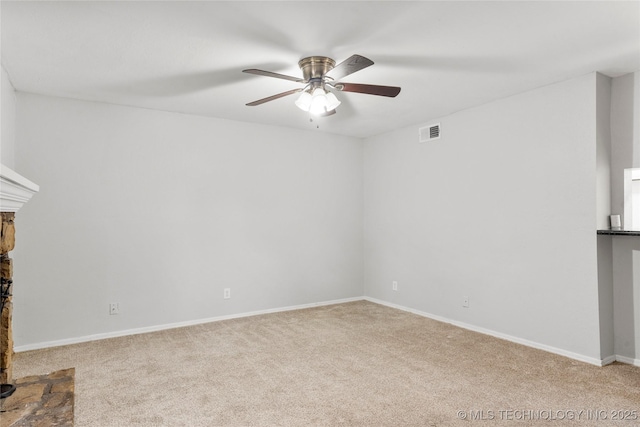 6364 S 80th E Ave Unit 34E, Tulsa, OK 74133 - unfurnished living room featuring carpet and a ceiling fan