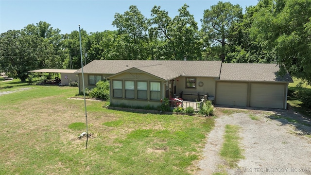 9730 S 4050th Rd, Talala, OK 74080 - ranch-style house featuring dirt driveway, a garage, and a front yard