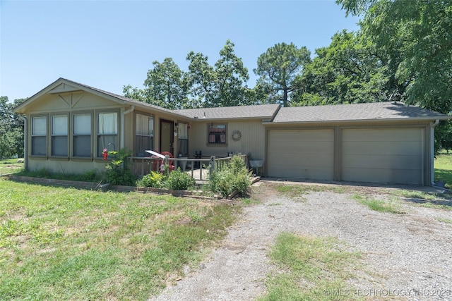 9730 S 4050th Rd, Talala, OK 74080 - single story home featuring dirt driveway and an attached garage
