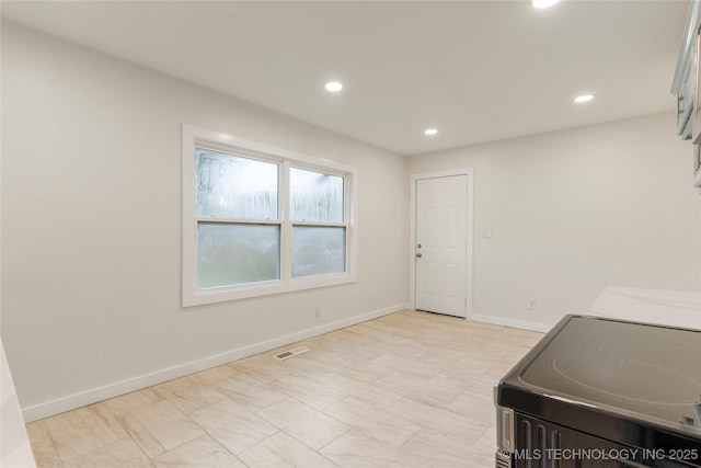 4138 E 36th St, Tulsa, OK 74135 - laundry room featuring recessed lighting and baseboards
