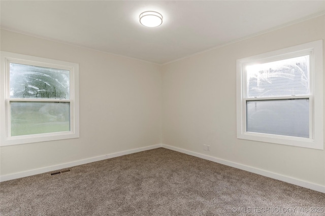 4138 E 36th St, Tulsa, OK 74135 - carpeted spare room with baseboards and crown molding
