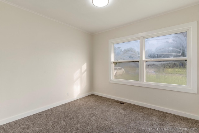 4138 E 36th St, Tulsa, OK 74135 - carpeted spare room with baseboards and crown molding