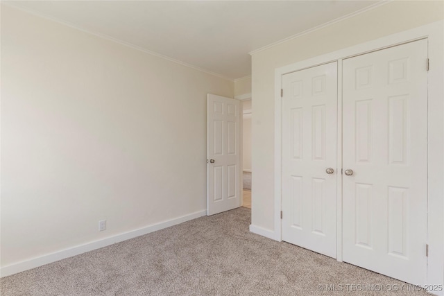 4138 E 36th St, Tulsa, OK 74135 - unfurnished bedroom featuring light carpet, ornamental molding, and a closet