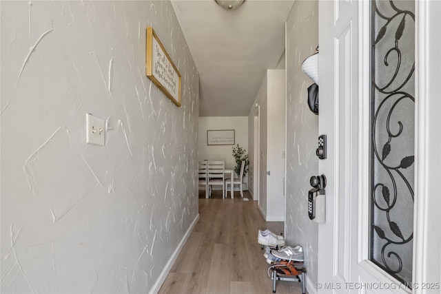 12209 E 30th Pl, Tulsa, OK 74129 - corridor with light wood-style floors and baseboards