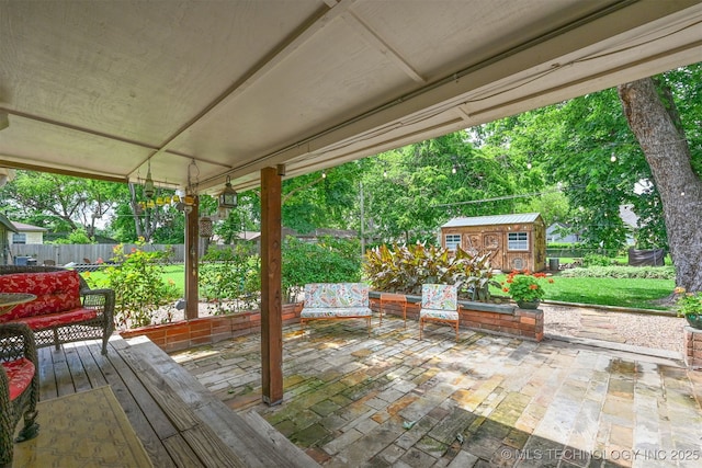 1347 E 37th St, Tulsa, OK 74105 - wooden terrace featuring a patio and a storage shed