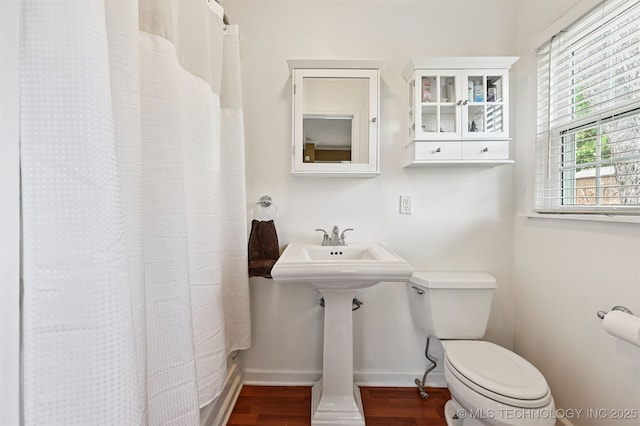 1347 E 37th St, Tulsa, OK 74105 - full bath with wood finished floors and a shower with curtain