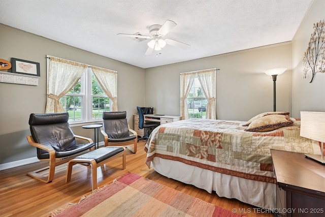 1347 E 37th St, Tulsa, OK 74105 - bedroom featuring light wood-type flooring and ceiling fan