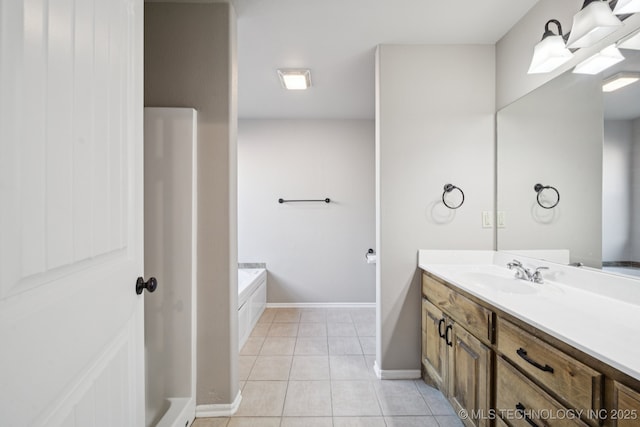 311 E 4th St, Skiatook, OK 74070 - full bathroom with vanity, a bath, and tile patterned flooring
