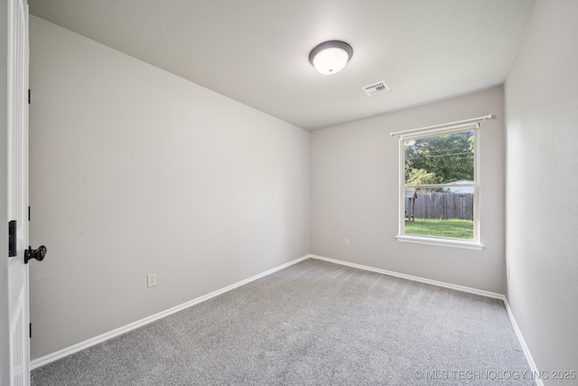 311 E 4th St, Skiatook, OK 74070 - spare room featuring carpet flooring