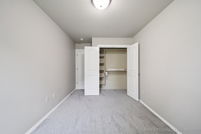 311 E 4th St, Skiatook, OK 74070 - unfurnished bedroom with carpet floors and a closet