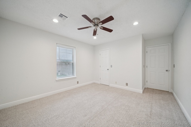 13111 E 80th St N, Owasso, OK 74055 - unfurnished room with ceiling fan, recessed lighting, and light colored carpet