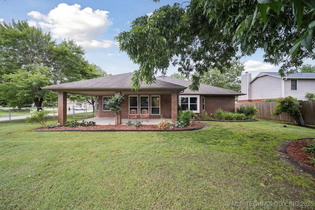 13111 E 80th St N, Owasso, OK 74055 - rear view of property featuring brick siding, a patio, roof with shingles, and a carport