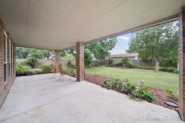 13111 E 80th St N, Owasso, OK 74055 - fenced backyard featuring a patio