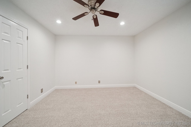 13111 E 80th St N, Owasso, OK 74055 - spare room with light carpet, ceiling fan, and recessed lighting