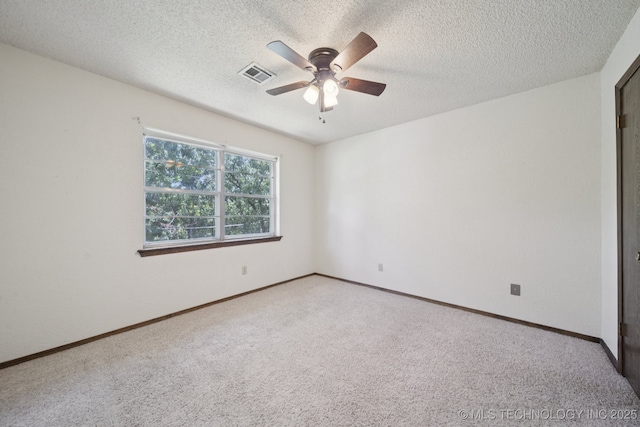 2519 W 53rd St, Tulsa, OK 74107 - carpeted spare room featuring a ceiling fan and a textured ceiling