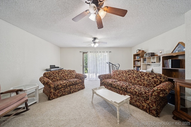 2519 W 53rd St, Tulsa, OK 74107 - carpeted living room featuring a textured ceiling and a ceiling fan