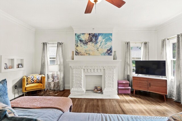1144 S Owasso Ave, Tulsa, OK 74120 - living area featuring crown molding, wood finished floors, and a ceiling fan