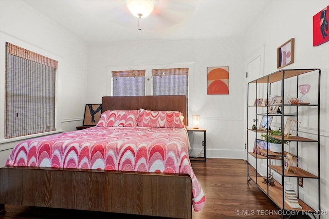 1144 S Owasso Ave, Tulsa, OK 74120 - bedroom featuring wood finished floors and baseboards