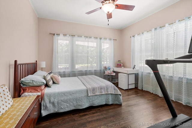 1144 S Owasso Ave, Tulsa, OK 74120 - bedroom with wood finished floors and ceiling fan