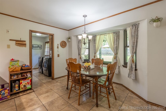 5833 E 78th Pl, Tulsa, OK 74136 - dining space with washer and clothes dryer, a chandelier, ornamental molding, and light tile patterned floors
