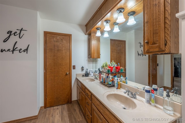 5833 E 78th Pl, Tulsa, OK 74136 - full bath featuring double vanity and wood finished floors