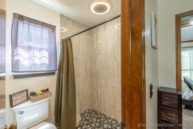 5833 E 78th Pl, Tulsa, OK 74136 - full bathroom with tiled shower and toilet