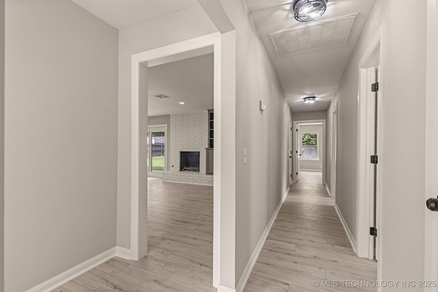 9421 S 69th E Ave, Tulsa, OK 74133 - hall with light wood-type flooring and attic access