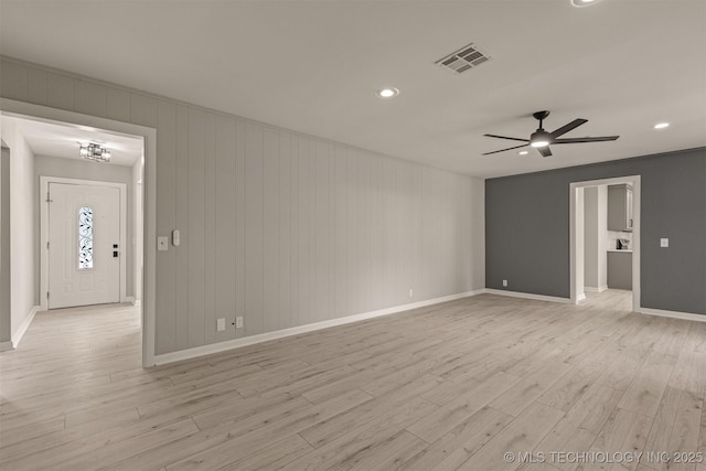 9421 S 69th E Ave, Tulsa, OK 74133 - empty room with light wood-type flooring, ceiling fan, and recessed lighting