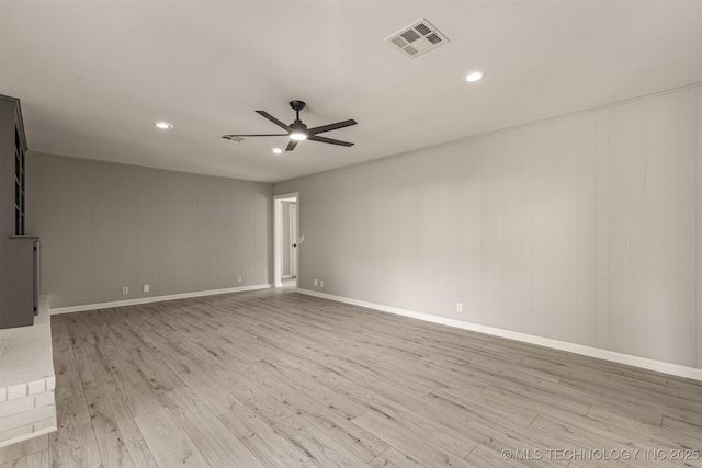 9421 S 69th E Ave, Tulsa, OK 74133 - empty room featuring light wood-type flooring, a ceiling fan, and recessed lighting