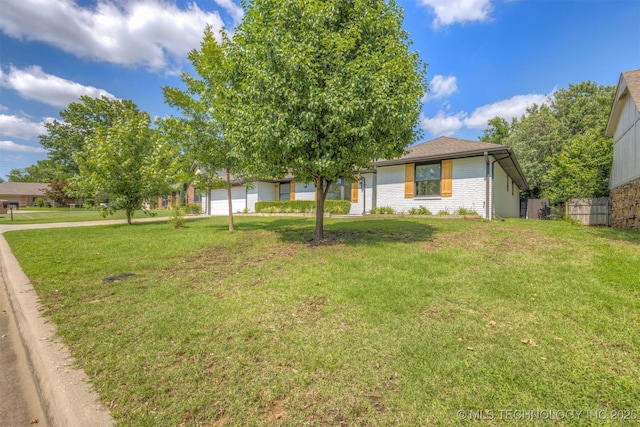 9421 S 69th E Ave, Tulsa, OK 74133 - view of front of property with an attached garage