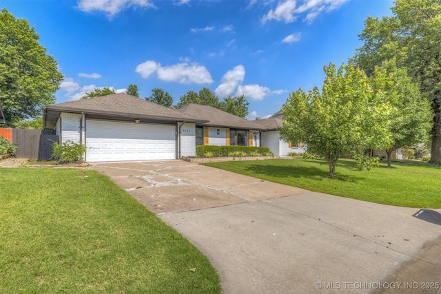 9421 S 69th E Ave, Tulsa, OK 74133 - single story home featuring a garage, driveway, brick siding, and a shingled roof