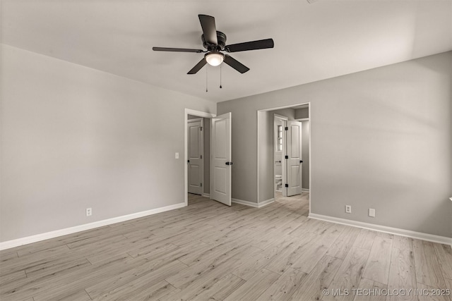 9421 S 69th E Ave, Tulsa, OK 74133 - unfurnished bedroom featuring light wood finished floors, a ceiling fan, and ensuite bathroom